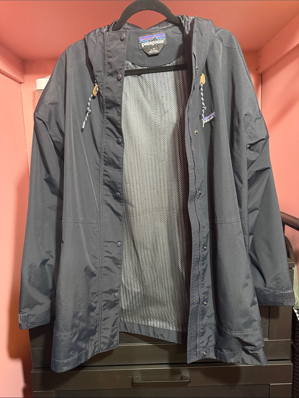Patagonia Womenβs Outdoor Everyday Navy Blue lined Rain Jacket with Hood
